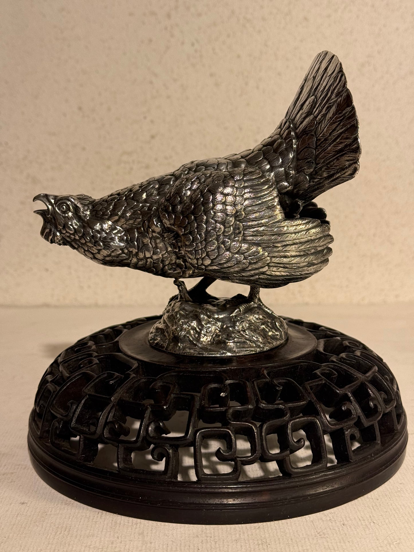 Antique silver-plated Bull sculpture, mounted on a beautifully carved Chinese wooden base. Early 1900s.