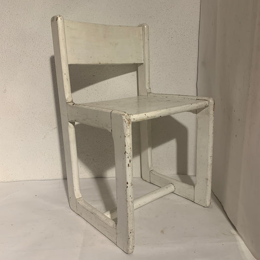 Vintage children's chair in painted wood, from the 1970s.