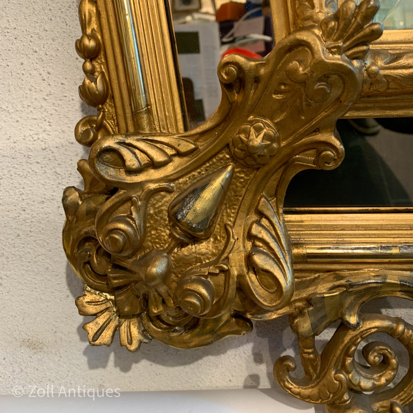 Antique German gilded mirror from the Historicism period.