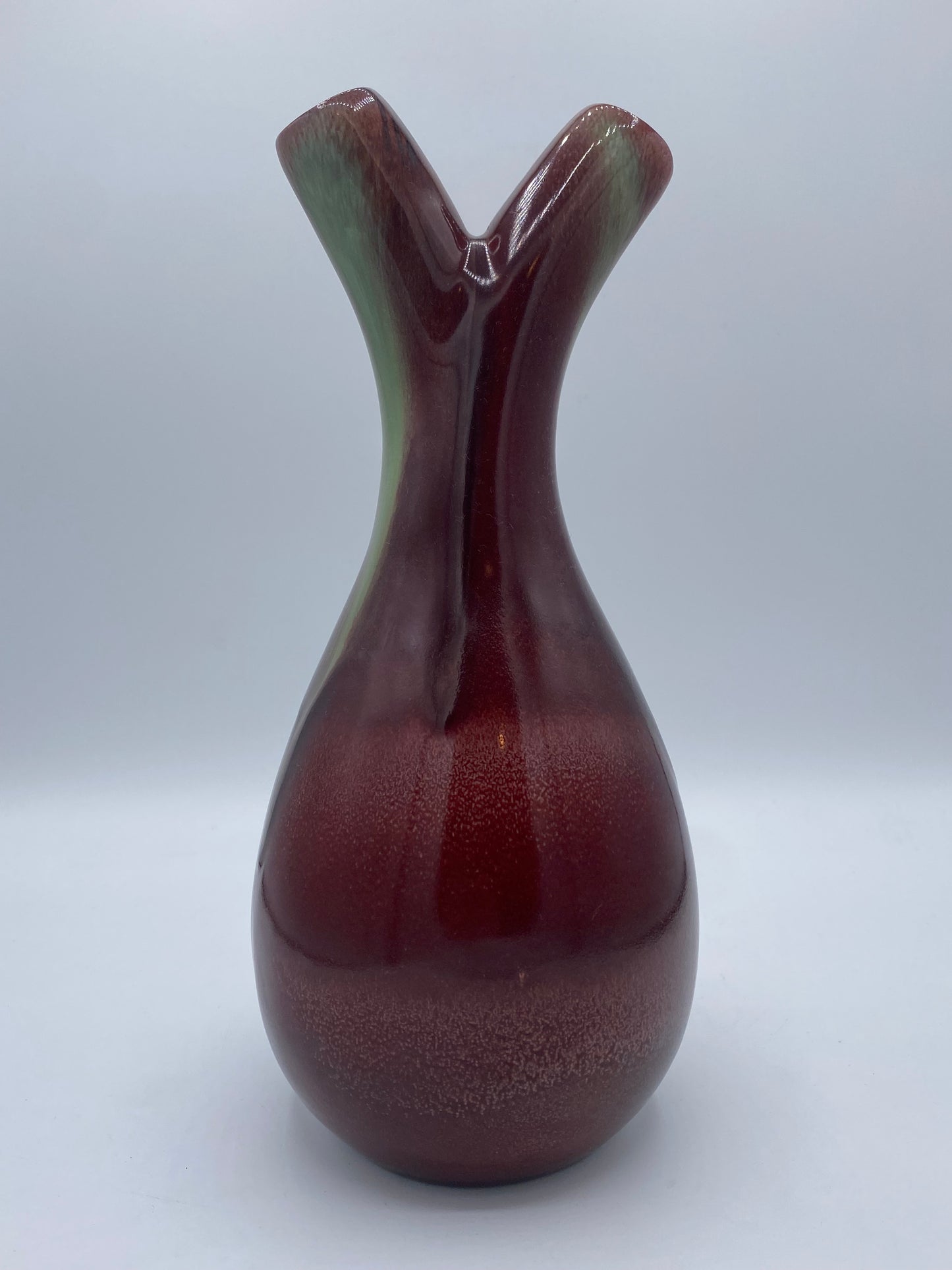 Vintage ceramic vase with ox blood glaze and gaffle neck. Scandinavia. Mid 20th century