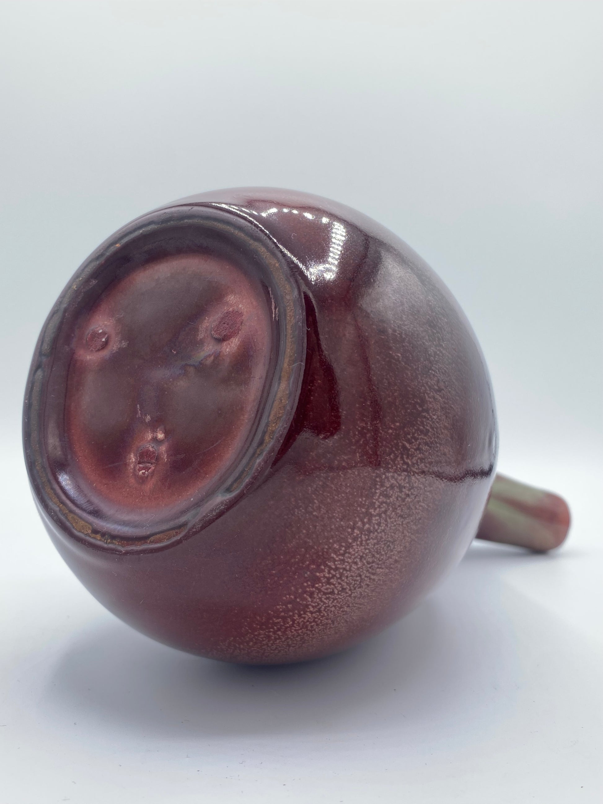 Vintage ceramic vase with horse blood glaze and spout. Scandinavia. Mid 20th century