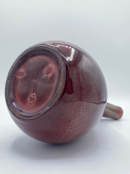 Vintage ceramic vase with horse blood glaze and spout. Scandinavia. Mid 20th century