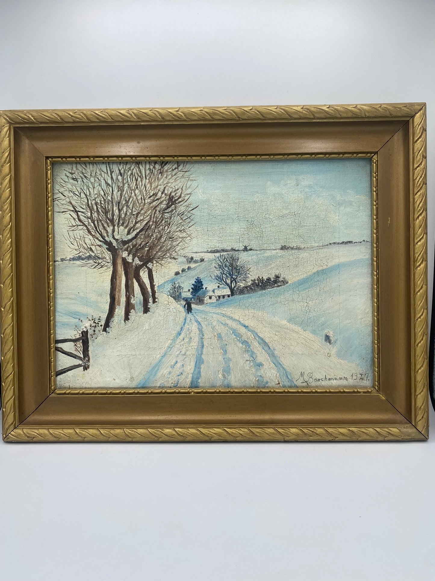 M. Barchmann. Naturalistisk oliemaleri af vinterlandskab med gående figur. Danmark. Fra 1927