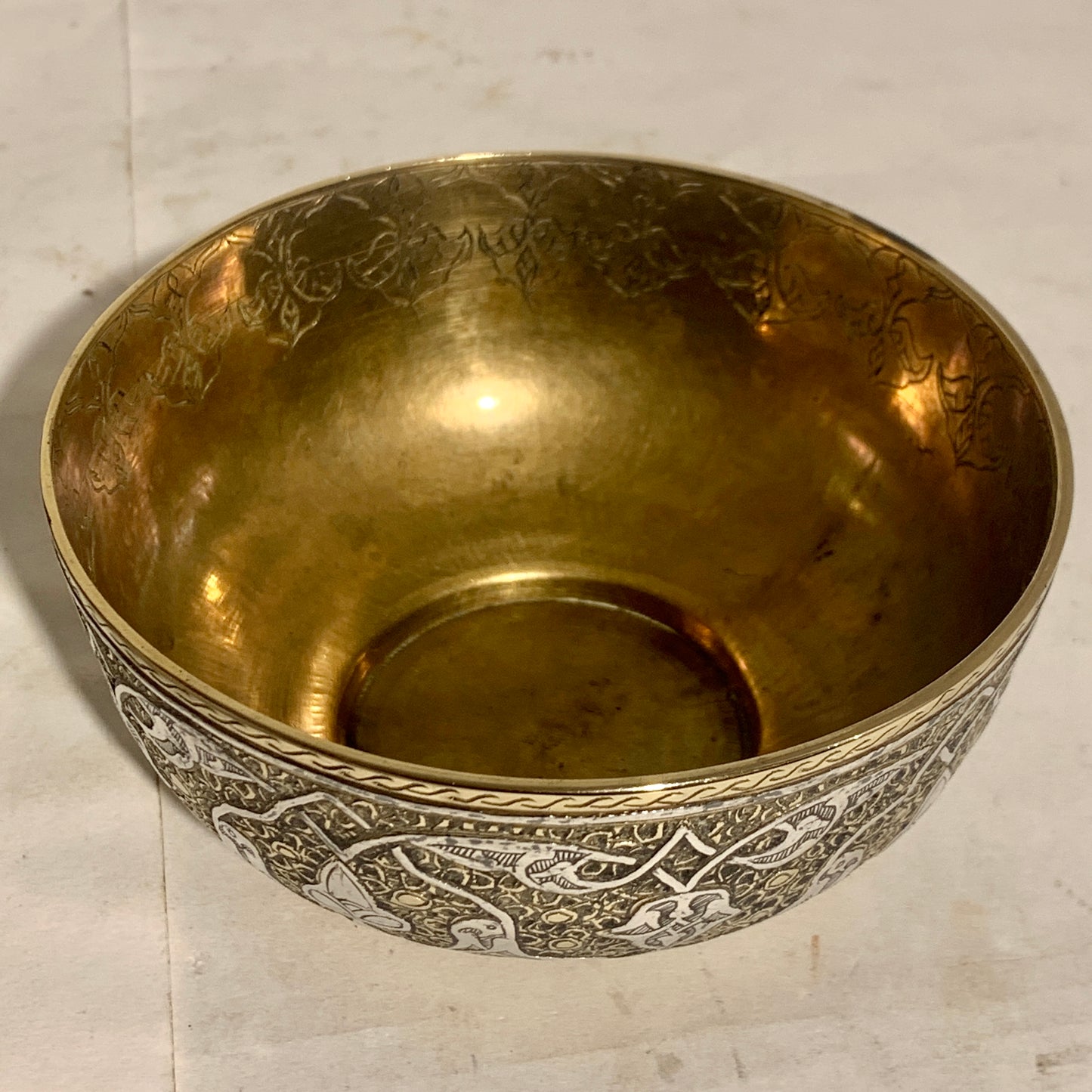 Antique Arabic/Persian silver and brass bowl, from the 1800s.