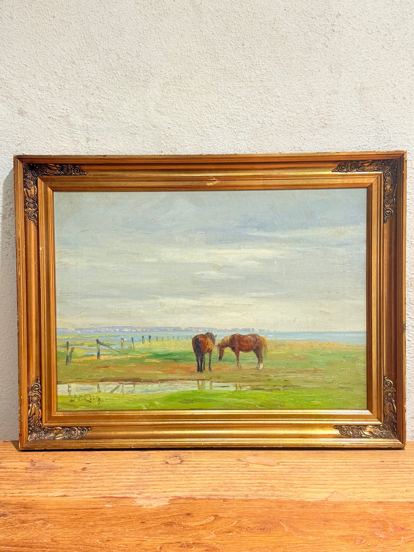 Niels Christiansen (f.1873-1960). Græssende heste. Naturalistisk  oliemaleri.