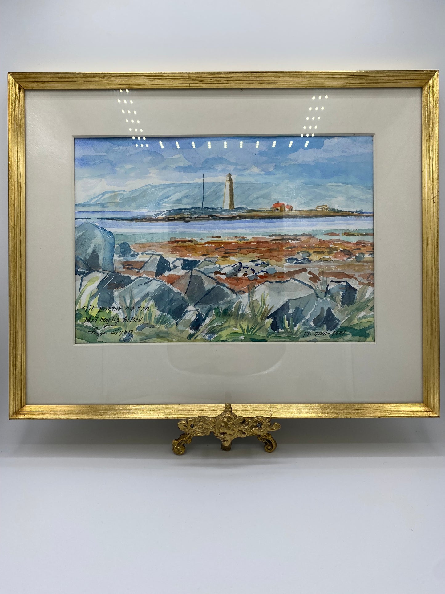Sigga Gyda. Impressionistisk akvarel af islandsk kystlandskab med fyrtårn. Island. Fra 1981