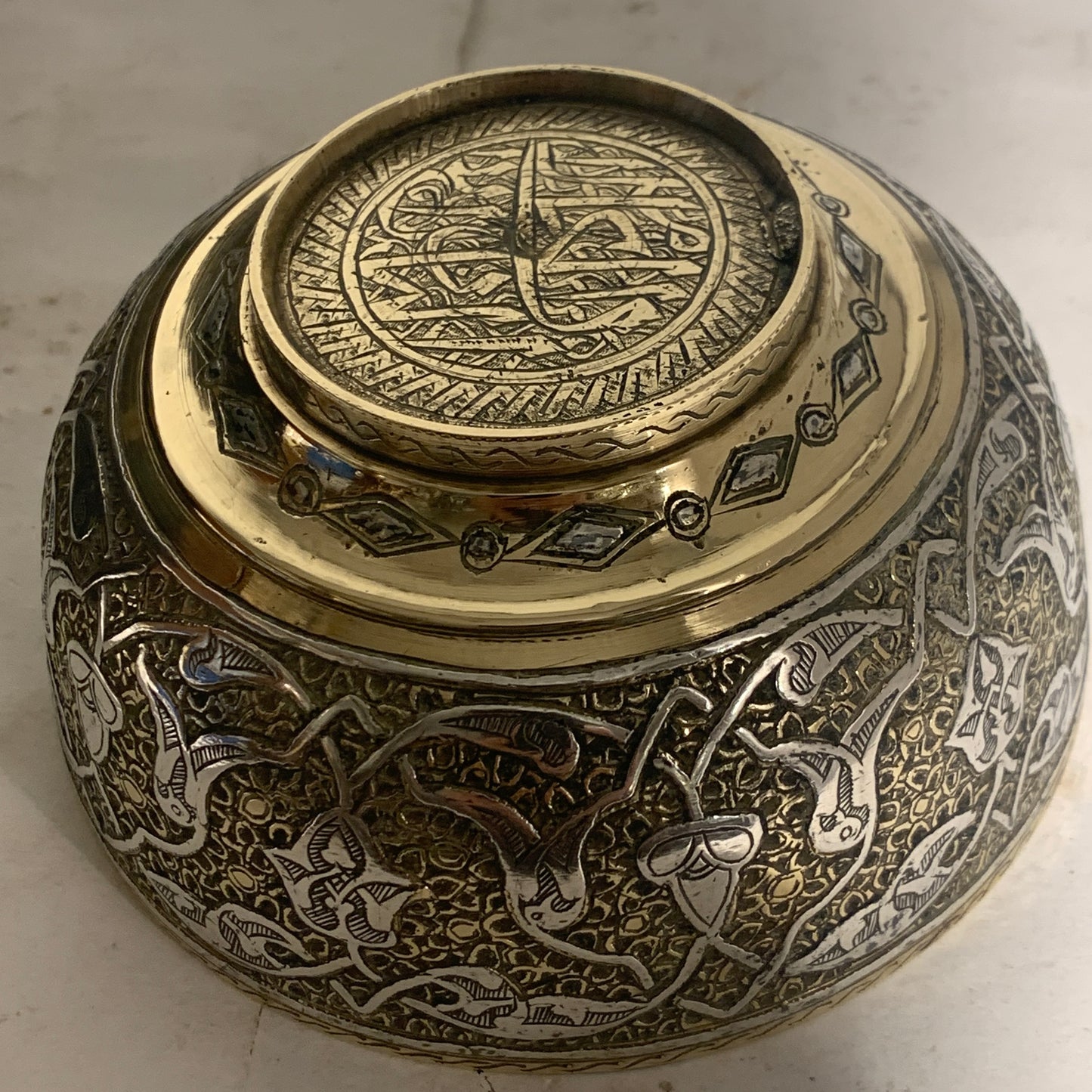 Antique Arabic/Persian silver and brass bowl, from the 1800s.