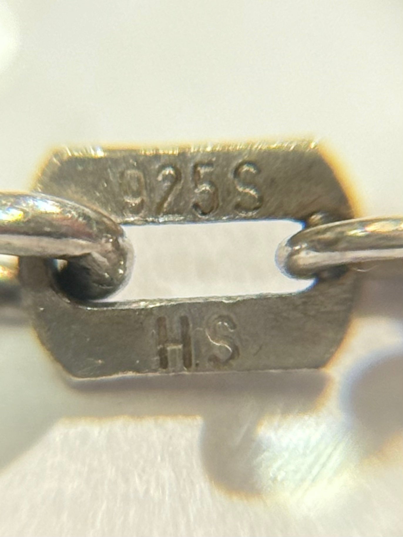 An antique silver necklace from the mid-20th century