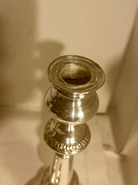 Antique candlesticks from the mid-19th century. In silver-plated copper.