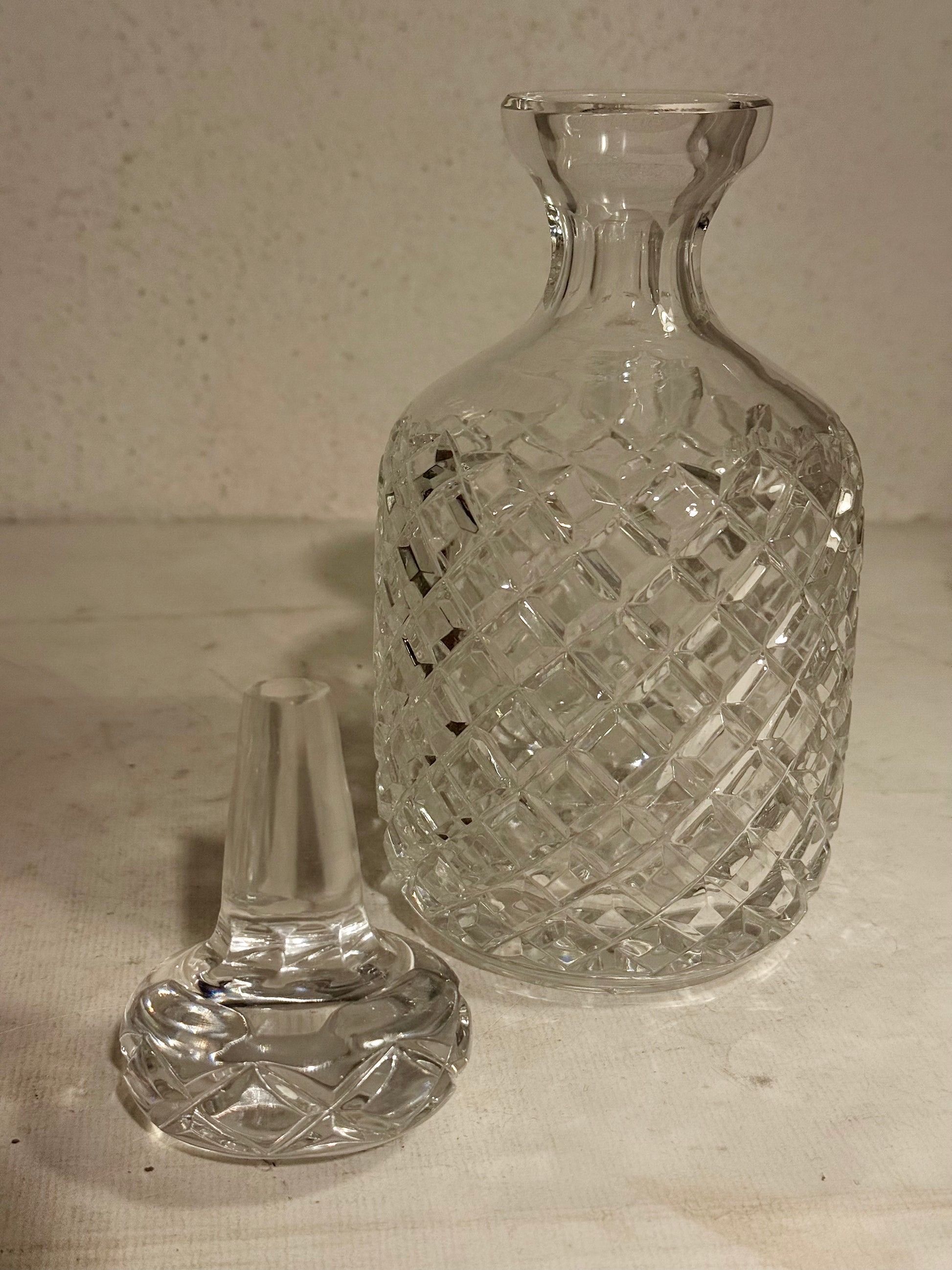 Vintage glass whiskey decanter from the mid-20th century