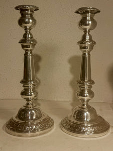 Antique candlesticks from the mid-19th century. In silver-plated copper.