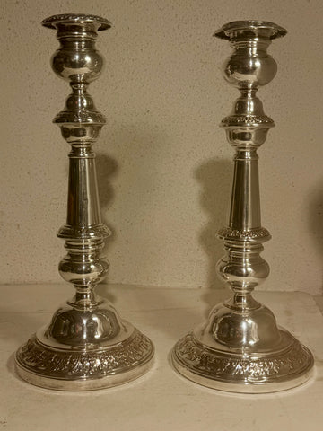 Antique candlesticks from the mid-19th century. In silver-plated copper.