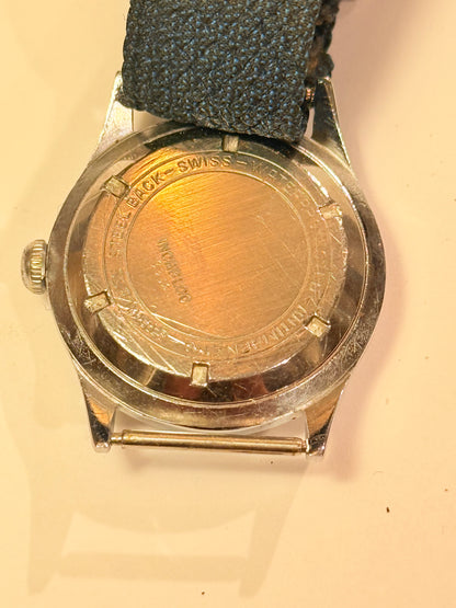 Vintage watch with a black strap. From mid/late 1950s