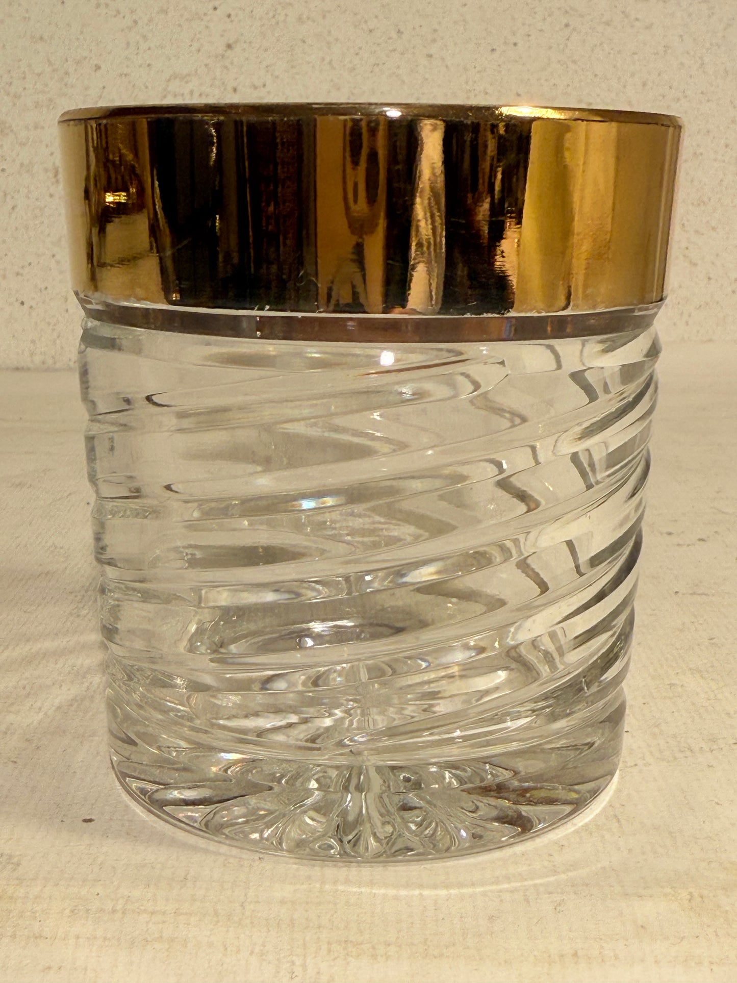 Vintage crystal whiskey glass with genuine gold trim