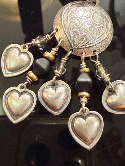 Vintage sterling silver heart earrings, USA. From the late 1900s.