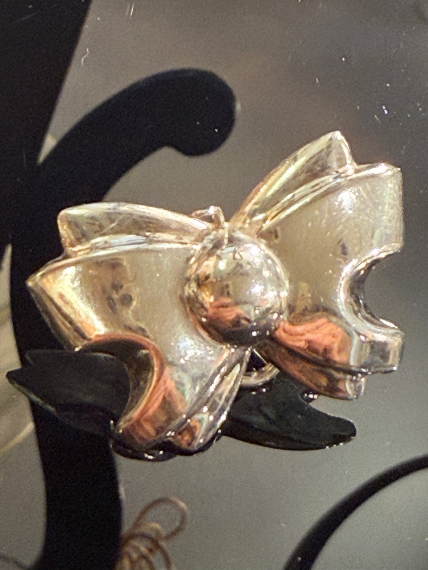 Vintage sterling silver bow earrings. From the late 1900s.