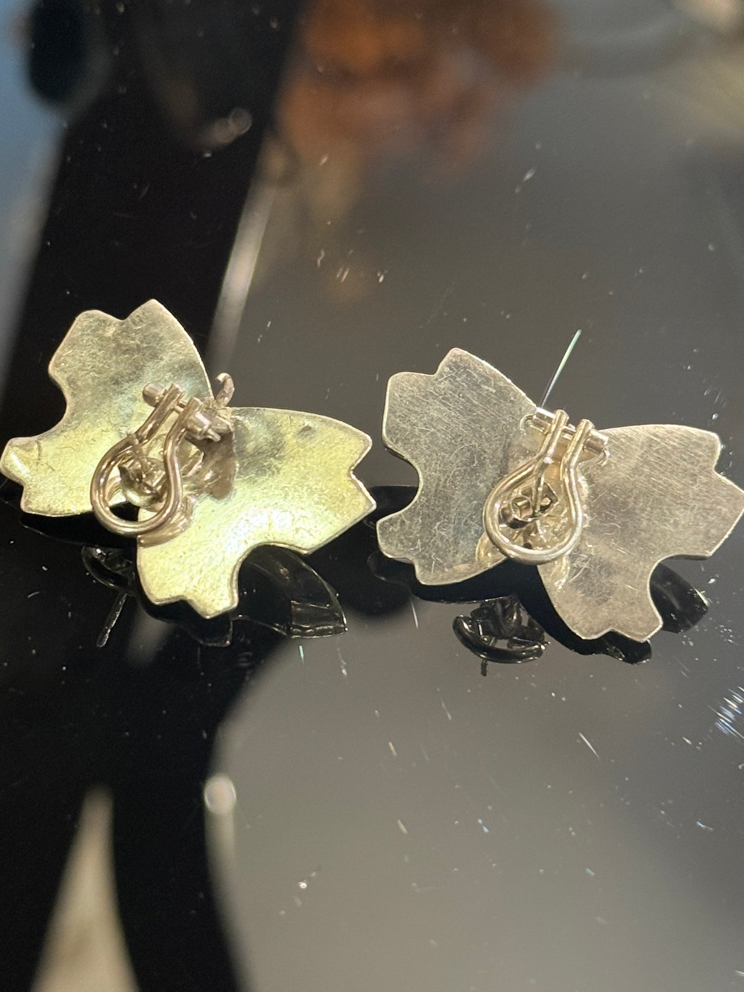 Vintage sterling silver bow earrings. From the late 1900s.