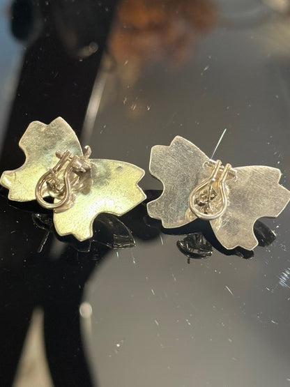 Vintage sterling silver bow earrings. From the late 1900s.
