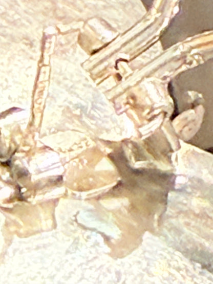 Vintage sterling silver bow earrings. From the late 1900s.