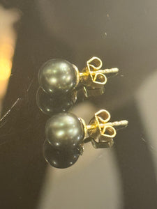 Carl Boesen (1981-.) 14 karat gold earrings, with hematite beads.
