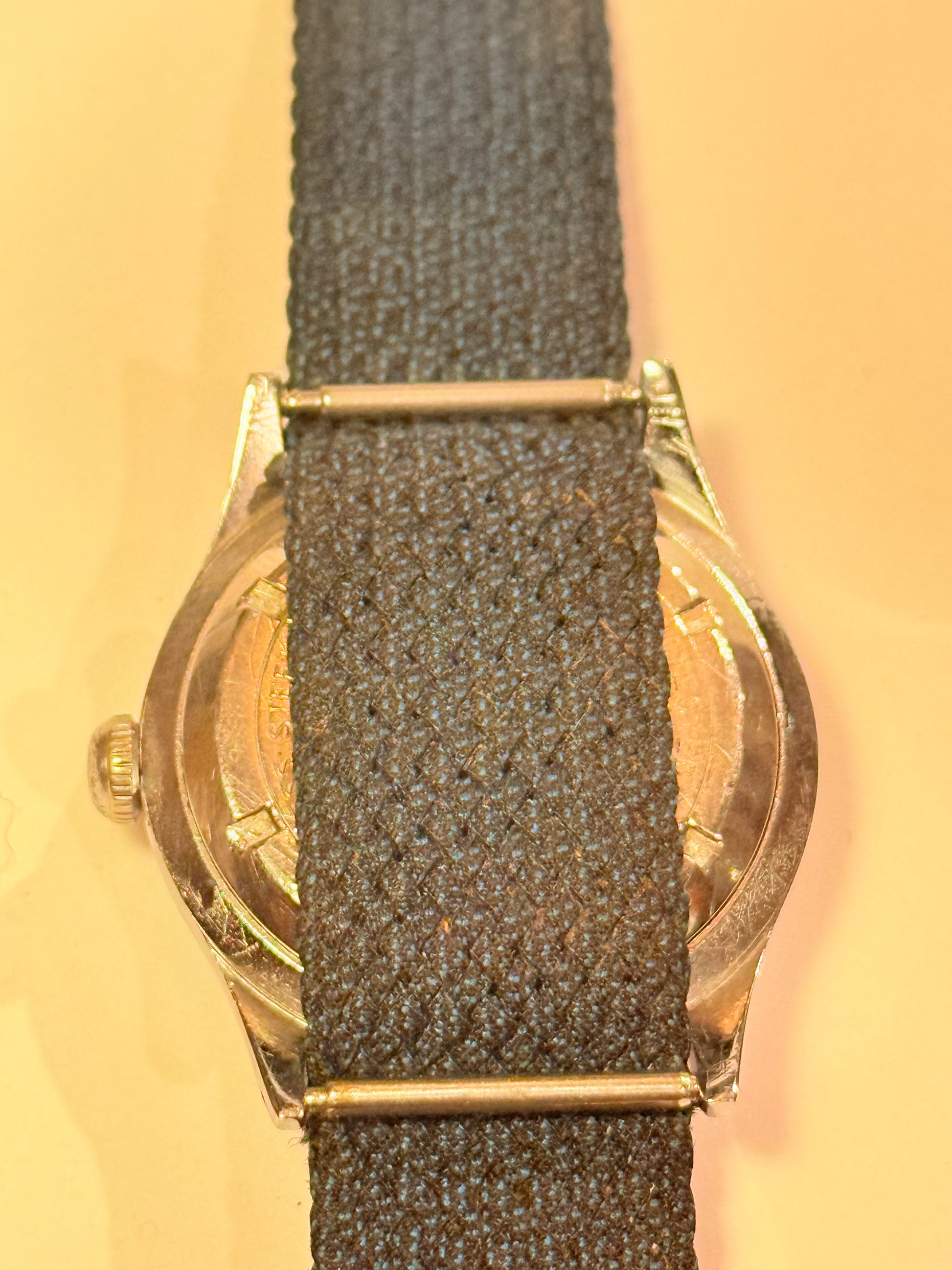 Vintage watch with a blue strap from the mid/late 1950s