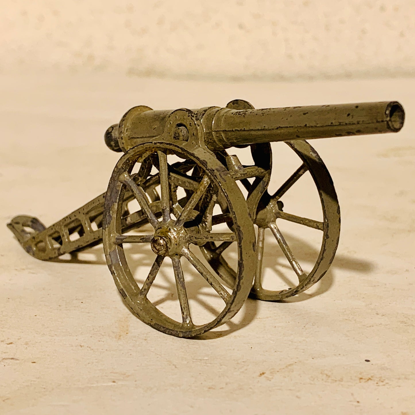 Antique metal toy cannon, from the early 1900s.
