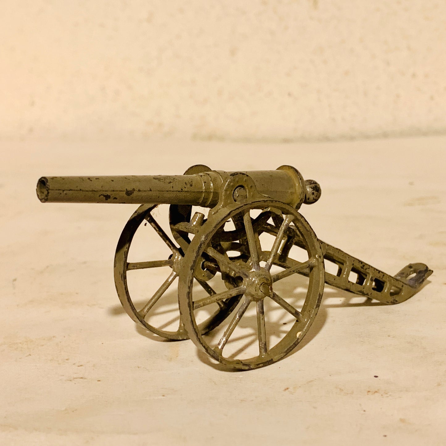 Antique metal toy cannon, from the early 1900s.