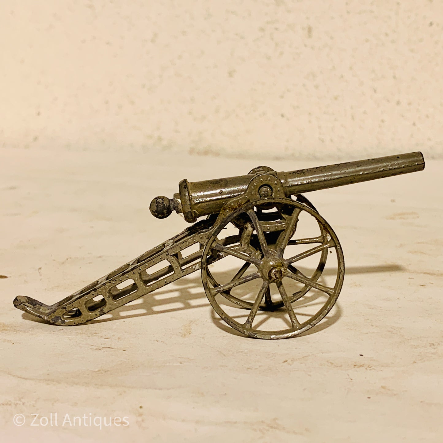 Antique metal toy cannon, from the early 1900s.