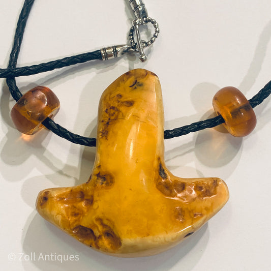 Stor ældre Thors hammer i mælkerav og sterling sølv.