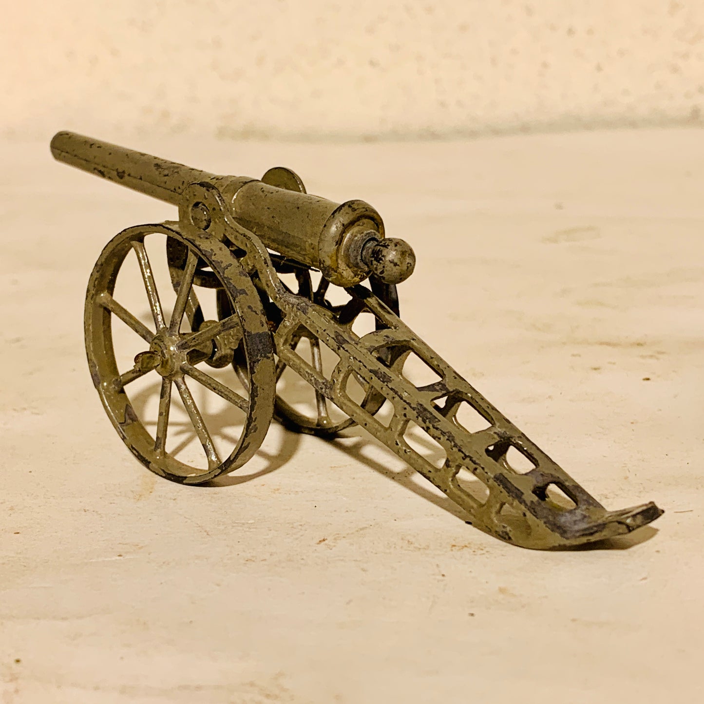 Antique metal toy cannon, from the early 1900s.