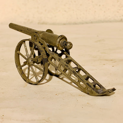 Antique metal toy cannon, from the early 1900s.