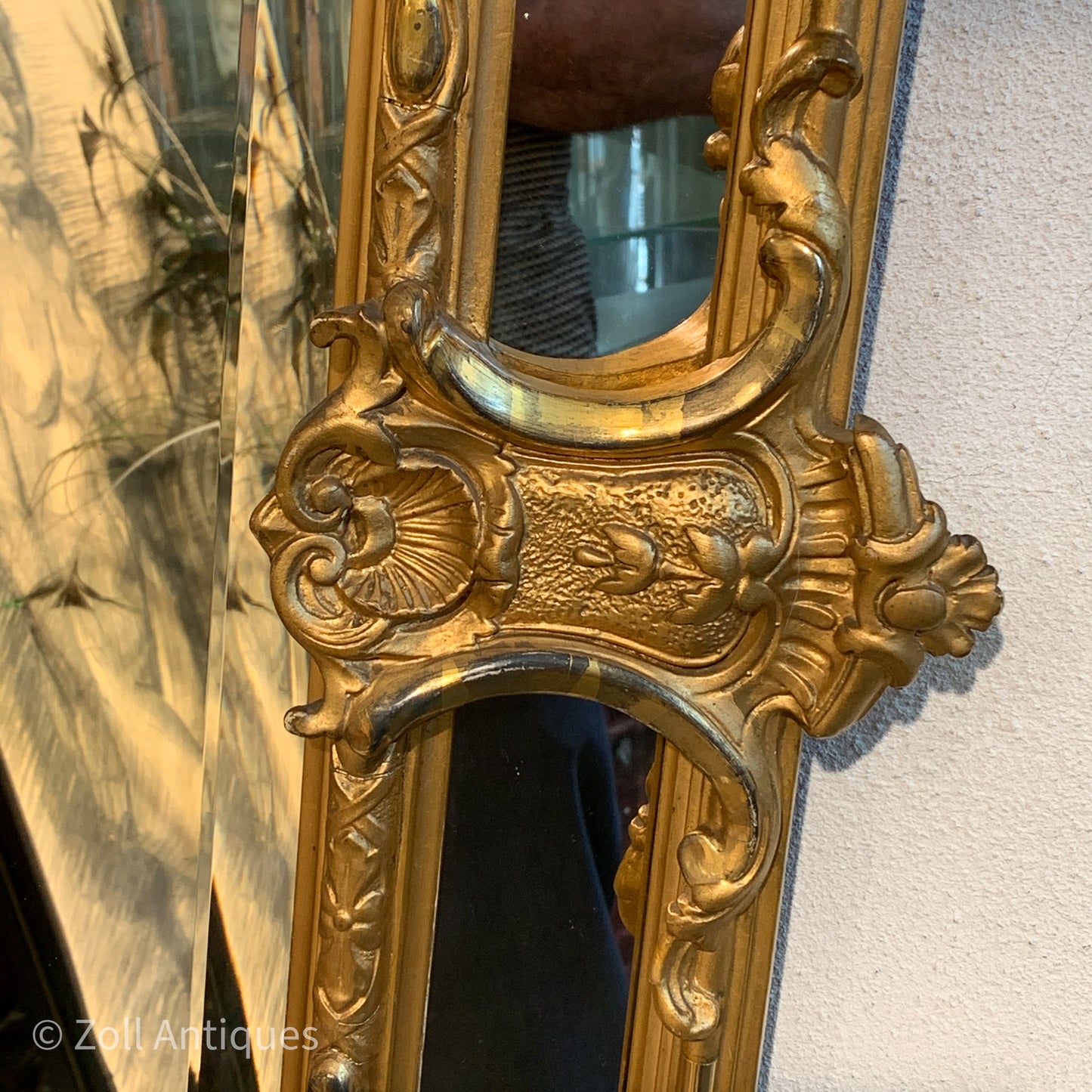 Antique German gilded mirror from the Historicism period.