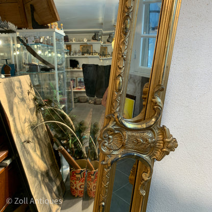 Antique German gilded mirror from the Historicism period.