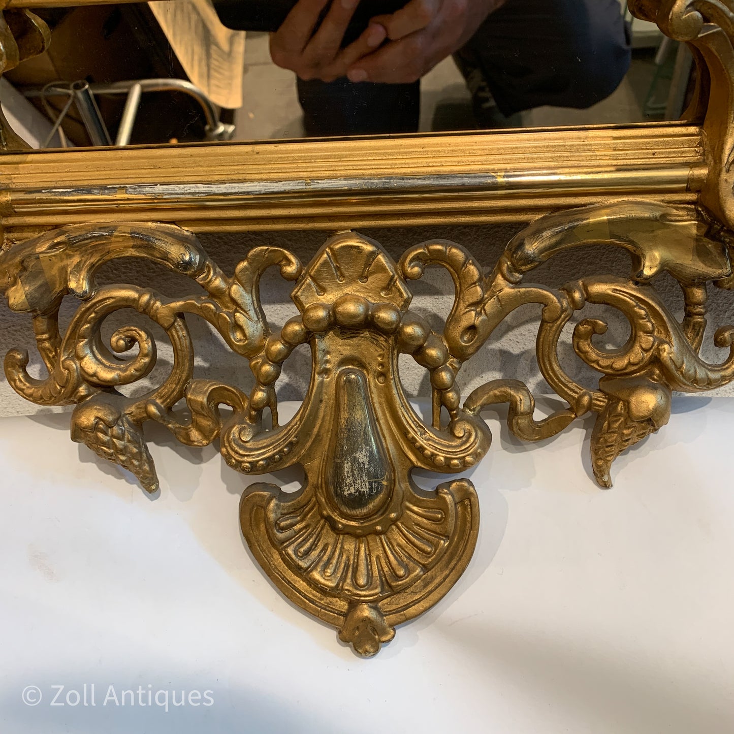 Antique German gilded mirror from the Historicism period.