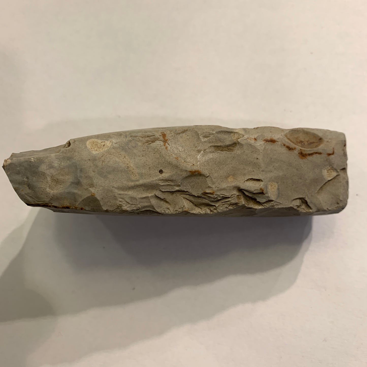 Dansk oldsag. Flintøkse fragtment. Yngre stenalder.