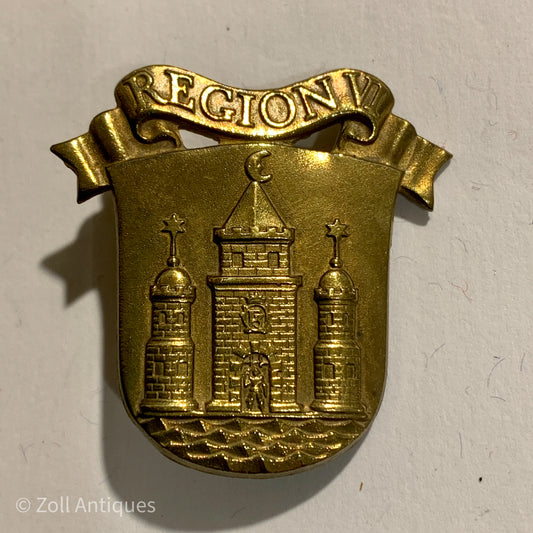 Hjemmeværnet region 6 bataljons mærke er et gammelt, guld-forged antikke mærke, der viser en bygning og en k