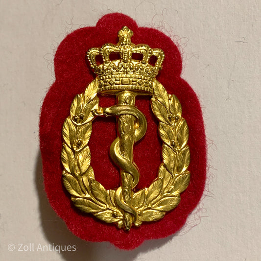 Forsvarets lægekorps mærke venstrevendt