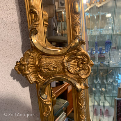 Antique German gilded mirror from the Historicism period.