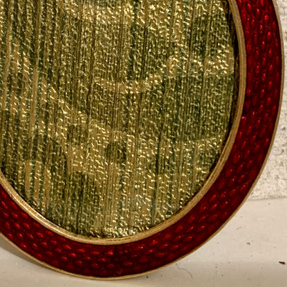 Antique oval enamel frame, from the 19th century.
