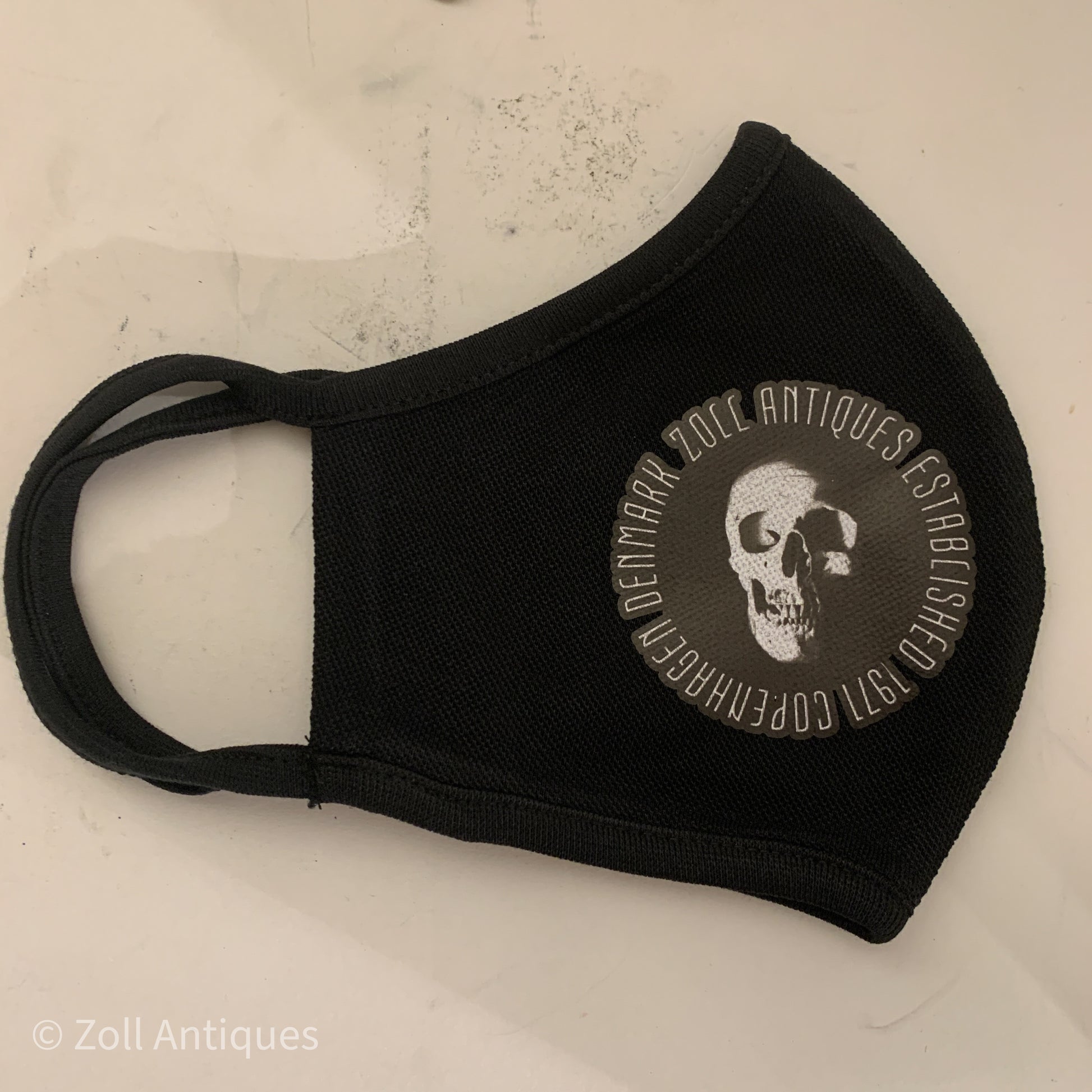 Zoll Antiques Skull Logo Mundbind