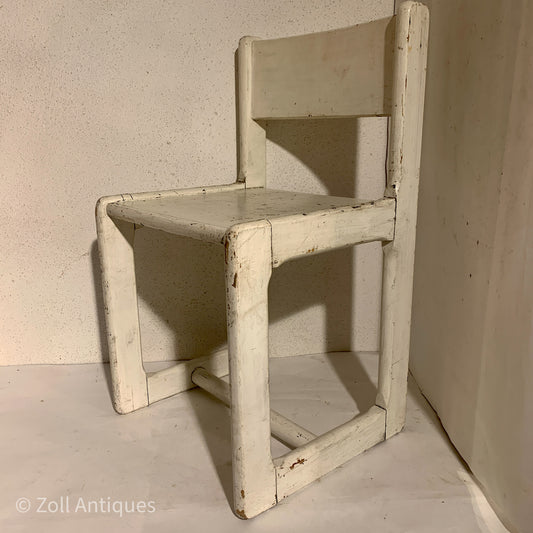 Vintage children's chair in painted wood, from the 1970s.